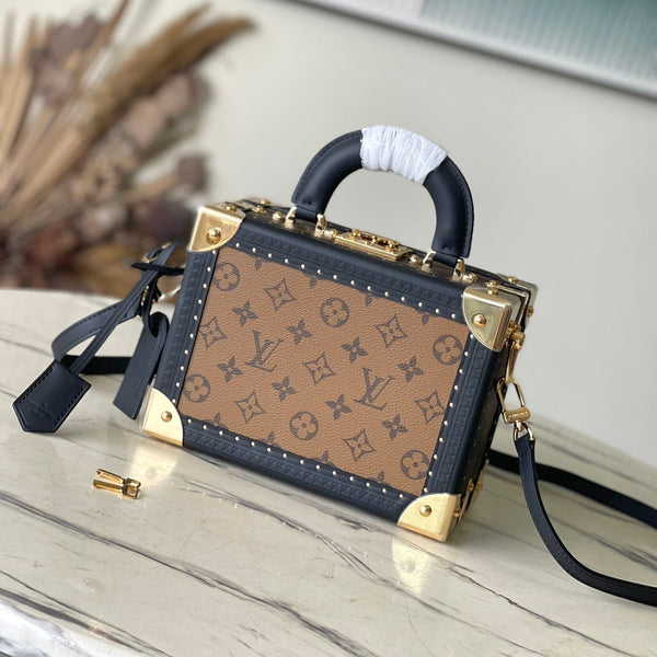 PETITE VALISE 22 IN BROWN MONOGRAM REVERSE CANVAS AND BLACK CALFSKIN TRIM GOLD HARDWARE